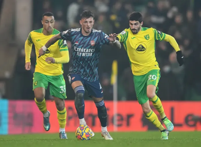 Framed Print : Arsenal's Ben White vs. Norwich's Pierre-Lees Melou: A Premier League Battle