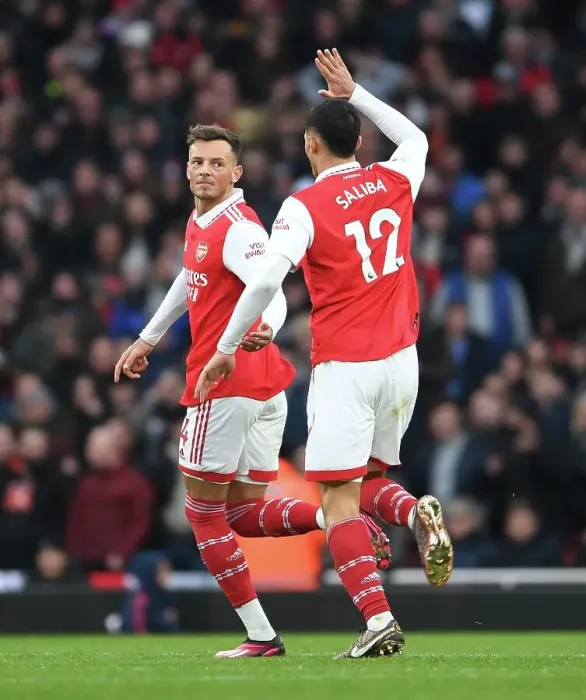 Framed Print : Arsenal's Ben White and William Saliba Celebrate Goals Against AFC Bournemouth in Premier League Clash (2022-23)