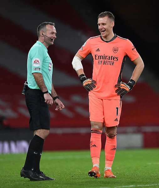 Arsenal's Bernd Leno Shares a Light-Hearted Moment with Referee Paul Tierney During Arsenal v Southampton Match, Premier League 2020-21