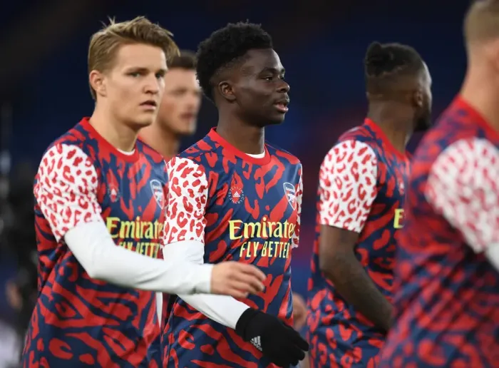 Framed Print : Arsenal's Bid for Victory: Saka Warms Up Ahead of Crystal Palace Clash (Premier League, April 2022)