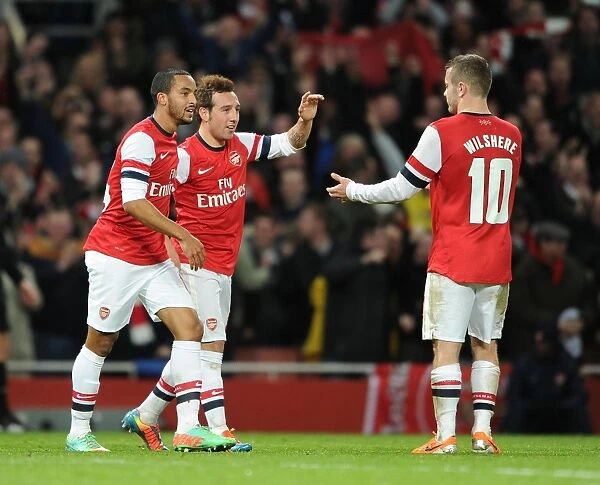 Arsenal's Big Three: Cazorla, Walcott, and Wilshere Celebrate First Goal Against Tottenham in FA Cup