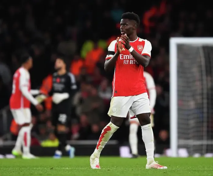 Framed Print : Arsenal's Bukayo Saka Acknowledges Fans Amidst the Drama: Arsenal FC vs Burnley FC, Premier League 2023-24