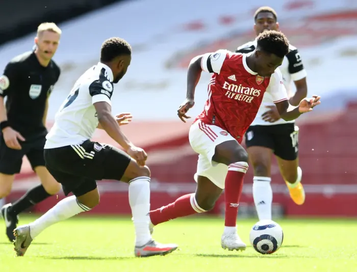 Framed Print : Arsenal's Bukayo Saka in Action against Fulham during Empty Emirates Stadium, Premier League 2020-21