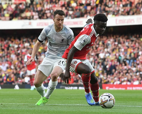 Arsenal's Bukayo Saka in Action Against Liverpool in the 2022-23 Premier League