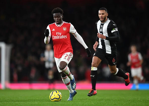 Arsenal's Bukayo Saka in Action against Newcastle United - Premier League 2019-2020