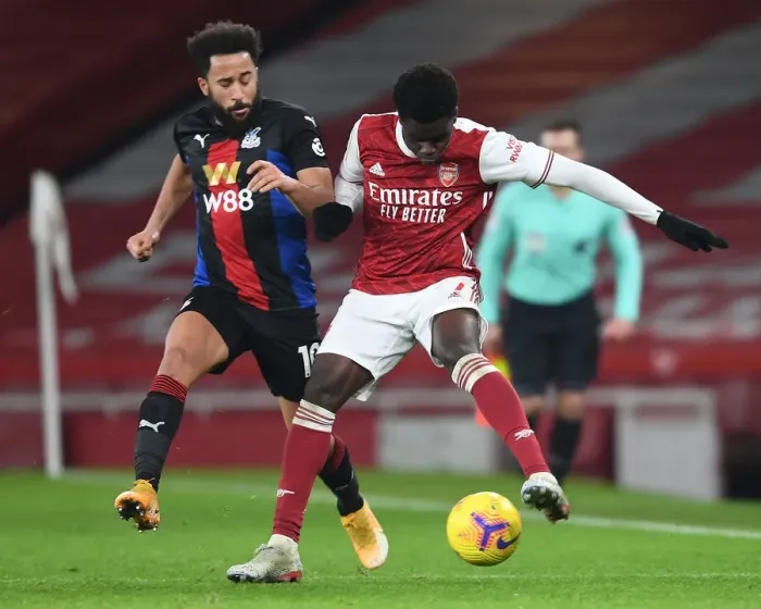 Framed Print : Arsenal's Bukayo Saka in Action: Premier League Clash Against Crystal Palace at Empty Emirates Stadium, 2020-21