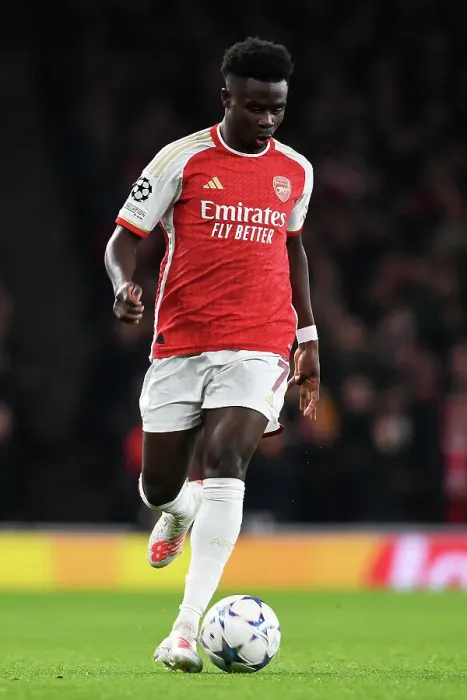 Framed Print : Arsenal's Bukayo Saka in Action against Sevilla in 2023-24 UEFA Champions League Framed Print : Arsenal's Bukayo Saka in Action against Sevilla in 2023-24 UEFA Champions League