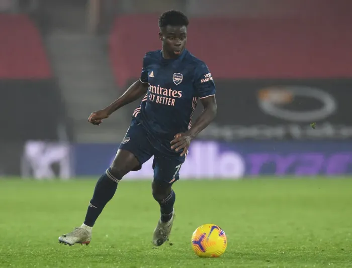Framed Print : Arsenal's Bukayo Saka in Action against Southampton in Empty St. Mary's Stadium (Premier League 2020-21) Framed Print : Arsenal's Bukayo Saka in Action against Southampton in Empty St. Mary's Stadium (Premier League 2020-21)