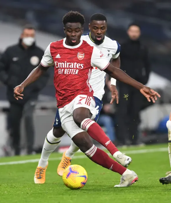 Framed Print : Arsenal's Bukayo Saka in Action against Tottenhotspur in 2020-21 Premier League Framed Print : Arsenal's Bukayo Saka in Action against Tottenhotspur in 2020-21 Premier League