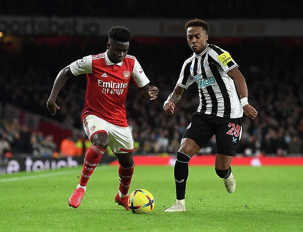 Arsenal's Bukayo Saka Clashes with Newcastle's Joe Willock in Premier League Showdown