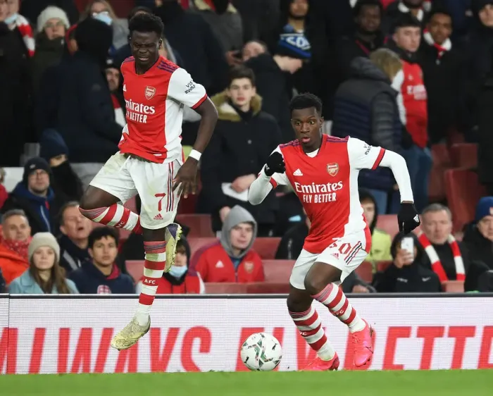 Framed Print : Arsenal's Bukayo Saka and Eddie Nketiah in Action against Liverpool in Carabao Cup Semi-Final