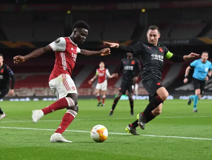 Framed Print : Arsenal's Bukayo Saka in Empty Europa League Quarterfinal: Arsenal vs Slavia Prague (2021)