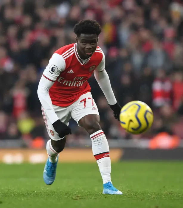 Framed Print : Arsenal's Bukayo Saka Faces Off Against Chelsea at the Emirates Stadium Framed Print : Arsenal's Bukayo Saka Faces Off Against Chelsea at the Emirates Stadium
