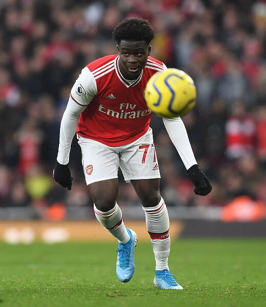 Arsenal's Bukayo Saka Faces Off Against Chelsea in Premier League Clash