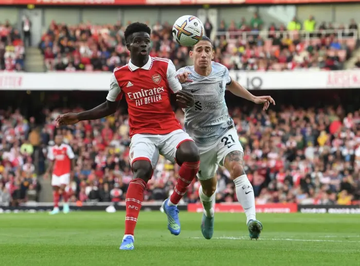 Framed Print : Arsenal's Bukayo Saka Faces Off Against Liverpool in the Premier League Framed Print : Arsenal's Bukayo Saka Faces Off Against Liverpool in the Premier League