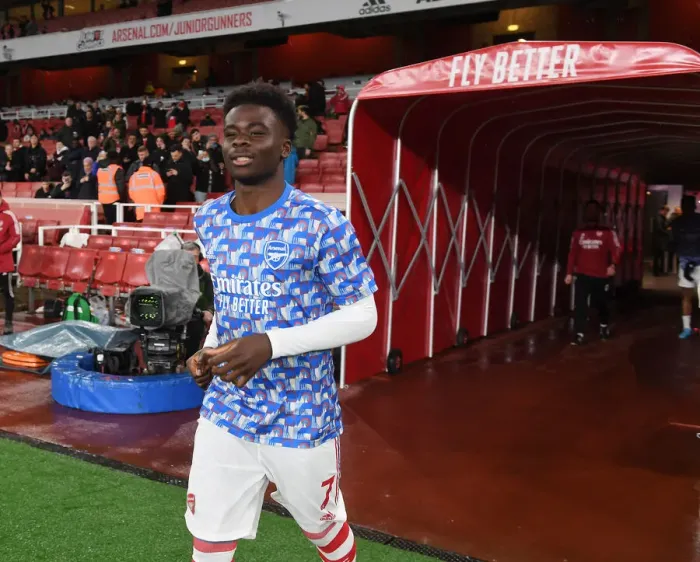 Framed Print : Arsenal's Bukayo Saka: Focused and Ready for Arsenal vs. Liverpool Showdown in Premier League