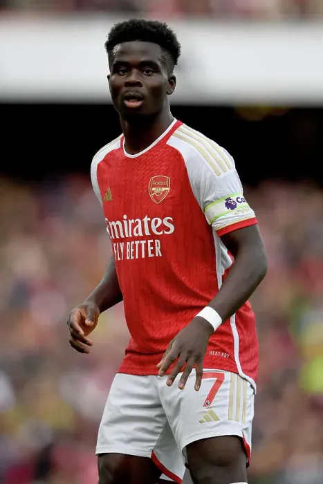 Framed Print : Arsenal's Bukayo Saka Focuses Amidst Premier League Clash Against Sheffield United (2023-24)