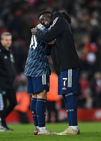 Arsenal's Bukayo Saka and Gabriel Martinelli Embrace in Carabao Cup Semi-Final Clash vs Liverpool