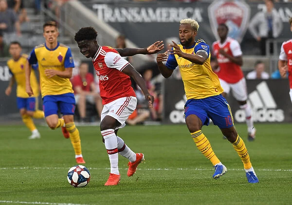 Arsenal's Bukayo Saka Goes Head-to-Head with Colorado Rapids Kellyn Acosta in Pre-Season Clash