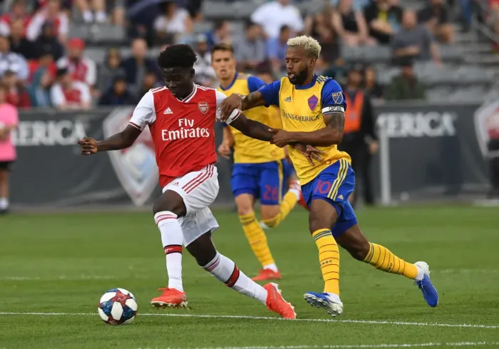 Framed Print : Arsenal's Bukayo Saka Goes Head-to-Head with Colorado Rapids Kellyn Acosta in Pre-Season Clash Framed Print : Arsenal's Bukayo Saka Goes Head-to-Head with Colorado Rapids Kellyn Acosta in Pre-Season Clash