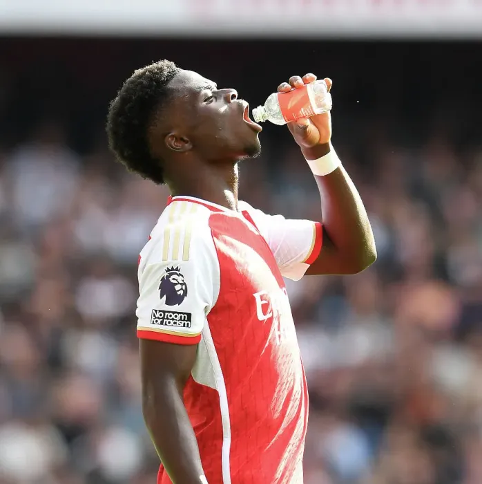 Framed Print : Arsenal's Bukayo Saka Goes Head-to-Head with Tottenham in the Intense 2023-24 Premier League Showdown