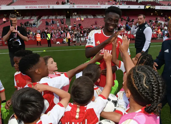 Framed Print : Arsenal's Bukayo Saka Greets Academy Players after Arsenal vs. Wolverhampton Wanderers (2022-23)