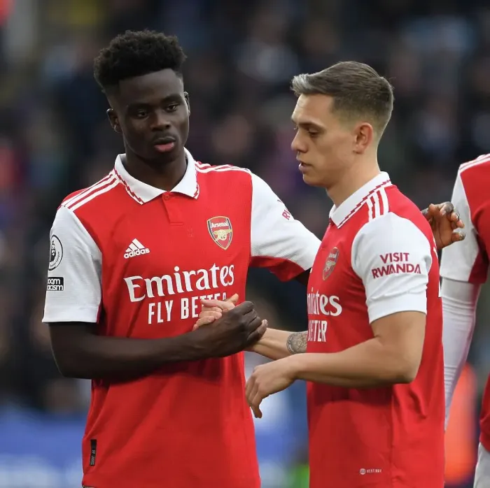 Framed Print : Arsenal's Bukayo Saka and Leandro Trossard Face Off Against Leicester City in the Premier League