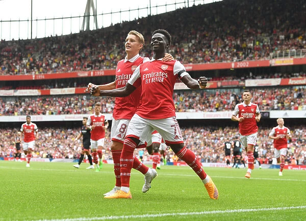 Arsenal's Bukayo Saka and Martin Odegaard Celebrate First Goal in Arsenal v Sevilla Emirates Cup 2022