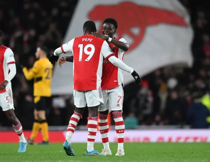 Framed Print : Arsenal's Bukayo Saka and Nicolas Pepe Celebrate Goal vs. Wolverhampton Wanderers (2021-22)