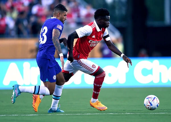 Arsenal's Bukayo Saka Outmaneuvers Chelsea's Emerson in Florida Cup Clash