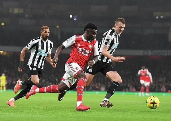 Arsenal's Bukayo Saka Outsmarts Newcastle's Dan Burn: A Premier League Tactical Showdown