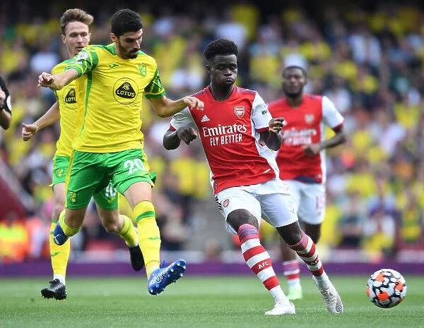 Arsenal's Bukayo Saka Outsmarts Norwich's Pierre-Lees Melou in Premier League Showdown