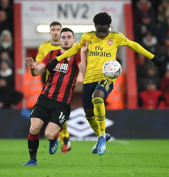 Framed Print : Arsenal's Bukayo Saka Outwits Lewis Cook: FA Cup Victory Moment