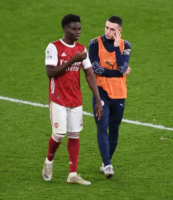 Framed Print : Arsenal's Bukayo Saka and Phil Foden Exchange Words After Arsenal v Manchester City, 2021-22 Premier League
