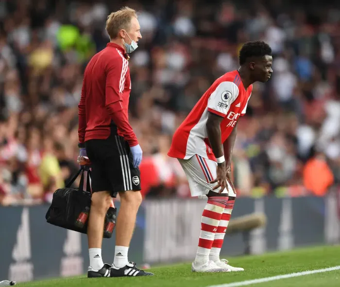 Framed Print : Arsenal's Bukayo Saka Receives Treatment: Arsenal v Tottenham Hotspur, Premier League 2021-22 Framed Print : Arsenal's Bukayo Saka Receives Treatment: Arsenal v Tottenham Hotspur, Premier League 2021-22