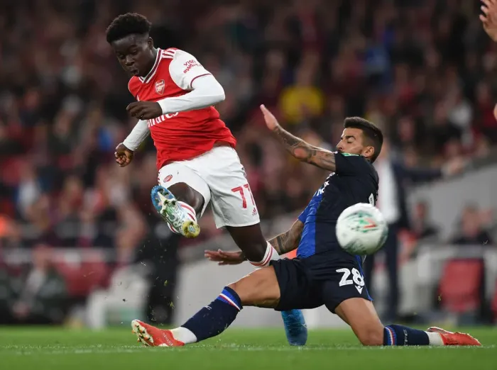 Framed Print : Arsenal's Bukayo Saka Scores Under Pressure Against Nottingham Forest in Carabao Cup Third Round Framed Print : Arsenal's Bukayo Saka Scores Under Pressure Against Nottingham Forest in Carabao Cup Third Round