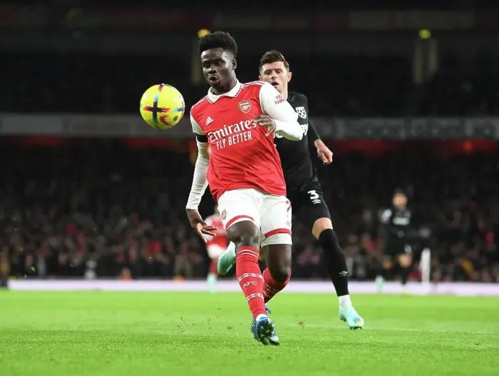 Framed Print : Arsenal's Bukayo Saka Shines in Holiday Showdown against West Ham United Framed Print : Arsenal's Bukayo Saka Shines in Holiday Showdown against West Ham United