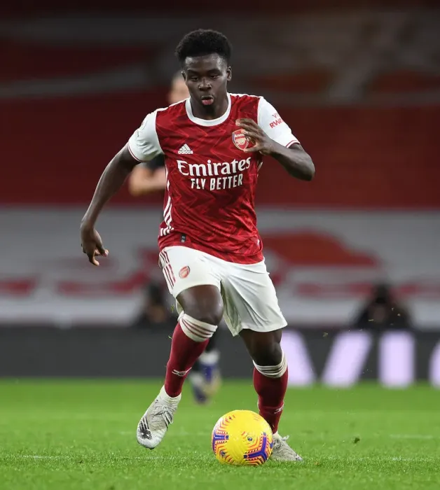 Framed Print : Arsenal's Bukayo Saka Shines in Limited-Capacity Premier League Clash Against Burnley Framed Print : Arsenal's Bukayo Saka Shines in Limited-Capacity Premier League Clash Against Burnley