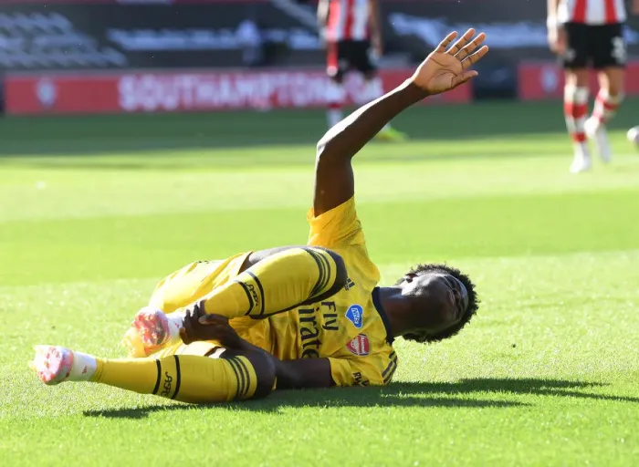 Framed Print : Arsenal's Bukayo Saka Suffers Injury in Southampton Clash (2019-20)
