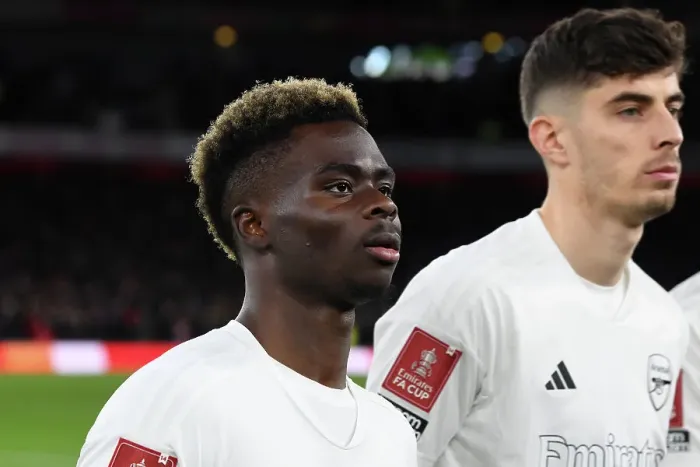 Framed Print : Arsenal's Bukayo Saka: Unwavering Focus Amidst Emirates FA Cup Battle Against Liverpool in Historic No More Red Kit