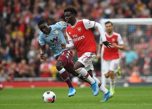 Arsenal's Bukayo Saka vs. Aston Villa's Marvelous Nakamba: A Premier League Battle at Emirates Stadium