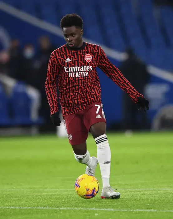 Framed Print : Arsenal's Bukayo Saka Warming Up Ahead of Brighton & Hove Albion Clash (Premier League 2020-21)