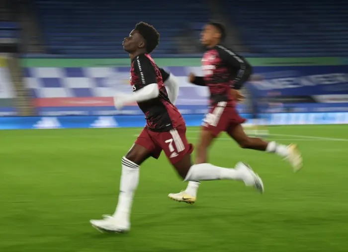 Framed Print : Arsenal's Bukayo Saka Warming Up Ahead of Leicester City Carabao Cup Clash Framed Print : Arsenal's Bukayo Saka Warming Up Ahead of Leicester City Carabao Cup Clash