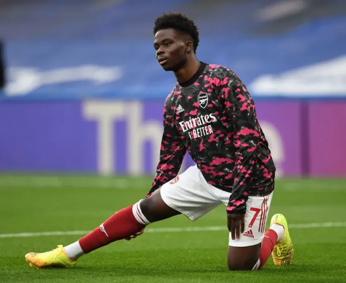 Framed Print : Arsenal's Bukayo Saka Warming Up: Chelsea vs Arsenal, Premier League 2020-21 (Behind Closed Doors) Framed Print : Arsenal's Bukayo Saka Warming Up: Chelsea vs Arsenal, Premier League 2020-21 (Behind Closed Doors)