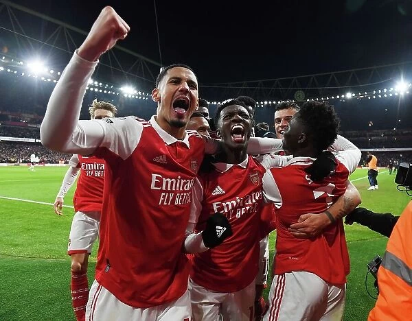 Arsenal's Bukayo Saka, Willian Saliba, and Eddie Nketiah Celebrate Goals Against Manchester United (2022-23)