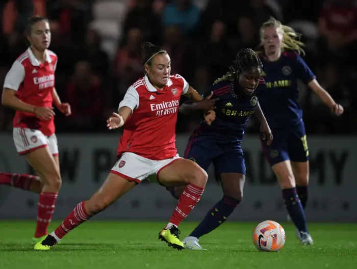 Framed Print : Arsenal's Caitlin Foord Fouls by Ajax's Liza van der Most in UEFA Women's Champions League Clash