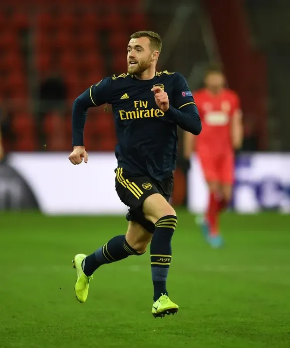 Framed Print : Arsenal's Calum Chambers in Action: Standard Liege vs. Arsenal, UEFA Europa League (December 2019)
