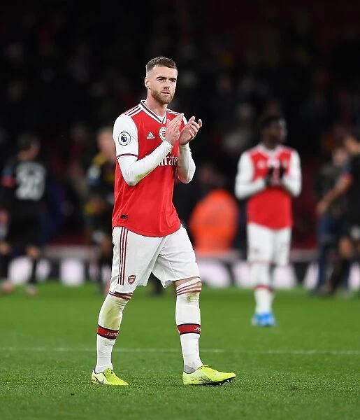 Arsenal's Calum Chambers Celebrates with Fans after Arsenal vs Manchester City, Premier League 2019-20