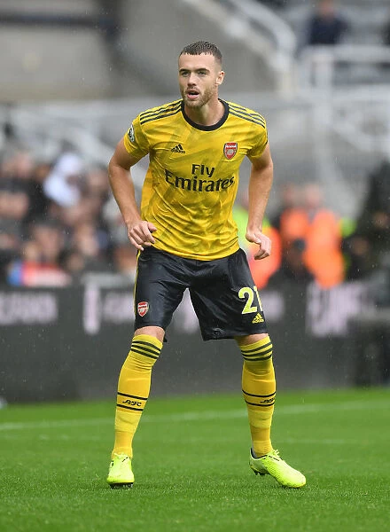 Arsenal's Calum Chambers Faces Newcastle United in Premier League Clash
