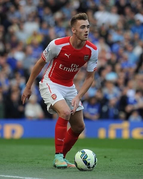 Arsenal's Calum Chambers Faces Off Against Chelsea at Stamford Bridge (2014-15 Premier League)
